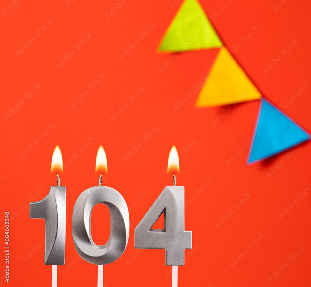 Birthday candle number 104 - Invitation card in orange background Birthday candle number 104 - Invitation card in orange background