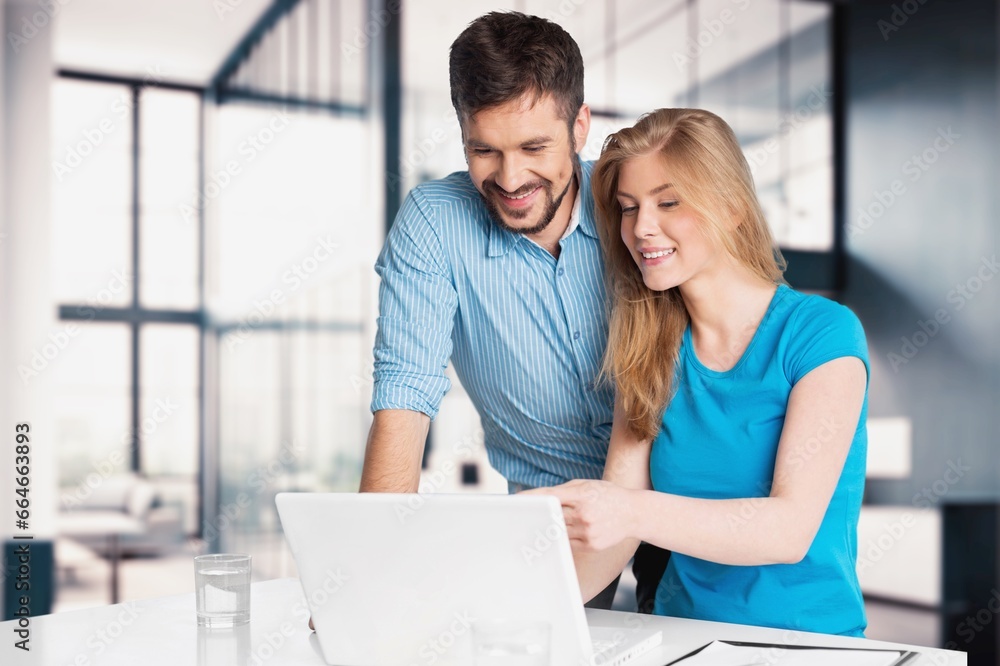 Doing Accounting Happy young Couple with Laptop, AI generated image Doing Accounting Happy young Couple with Laptop, AI generated image