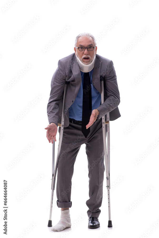 Old businessman after car accident isolated on white Old businessman after car accident isolated on white