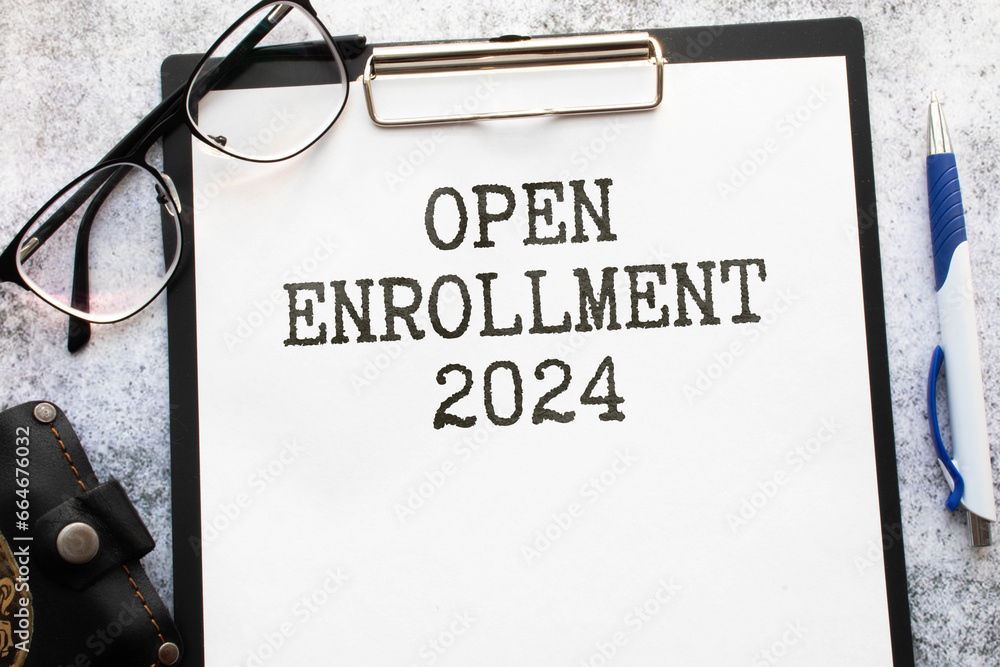 open enrollment 2024. text on a sticker next to money and banknotes