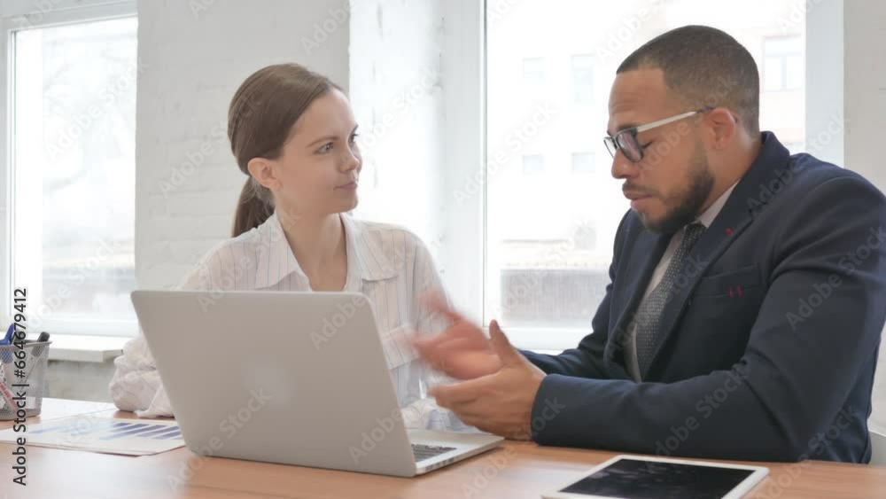 Businessman Talking with Female Teammate at Work Businessman Talking with Female Teammate at Work