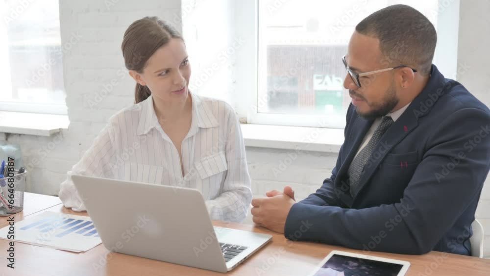 Businessman Talking with Businessman in Office Businessman Talking with Businessman in Office