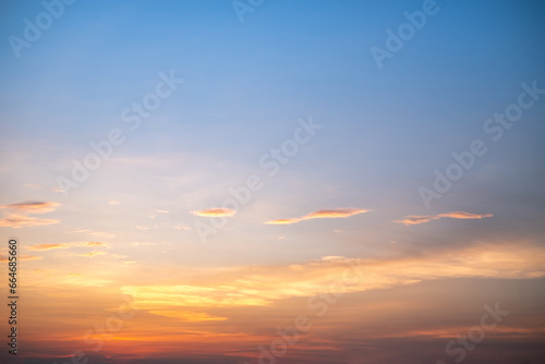 Beautiful of luxury soft gradient orange gold clouds and sunlight on the blue sky perfect for the background  take in everning Twilight