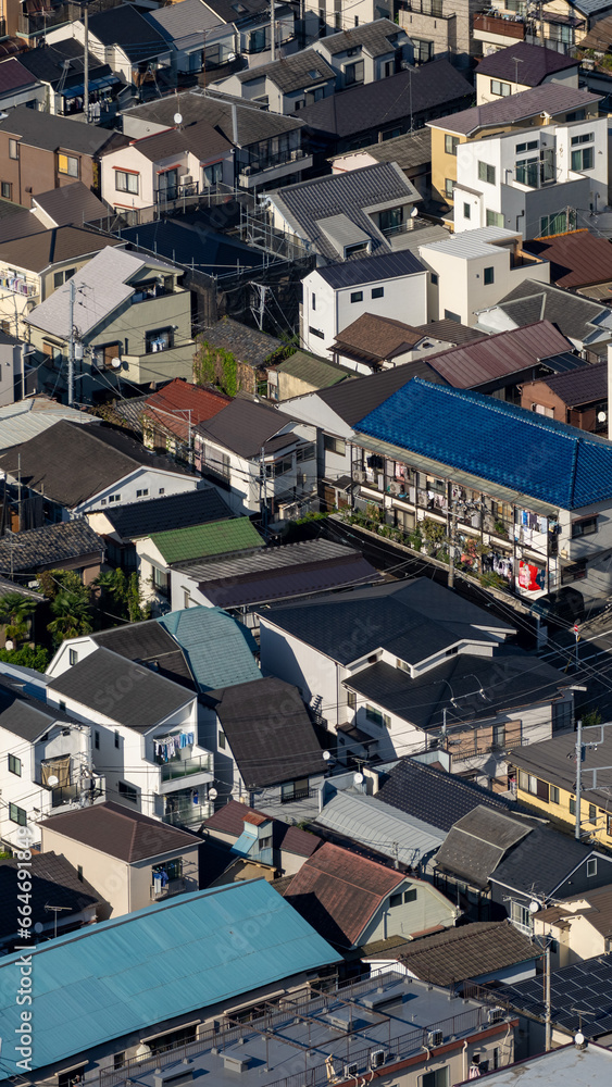 Greater Tokyo are dense buildings and houses at daytime. Greater Tokyo are dense buildings and houses at daytime.