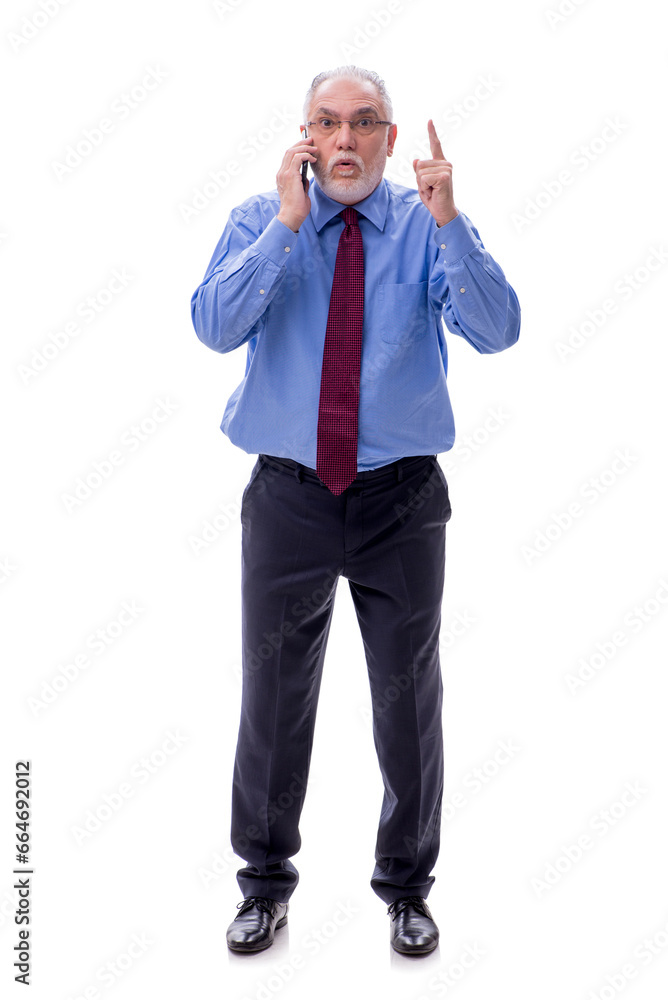 Old businessman talking by phone isolated on white Old businessman talking by phone isolated on white