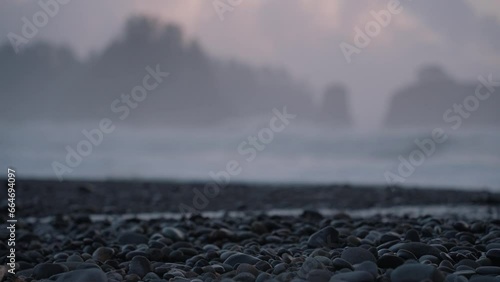 Misty Sunset and Slow Motion Waves at Rialto Coastal Ocean Beach on the Pacific Northwest in Washington, USA