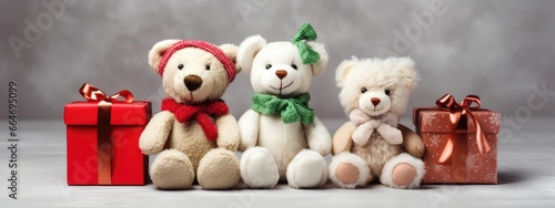 Teddy bears wearing a Santa hat on a festive New Year's background. Christmas card with animals. present. © AndErsoN