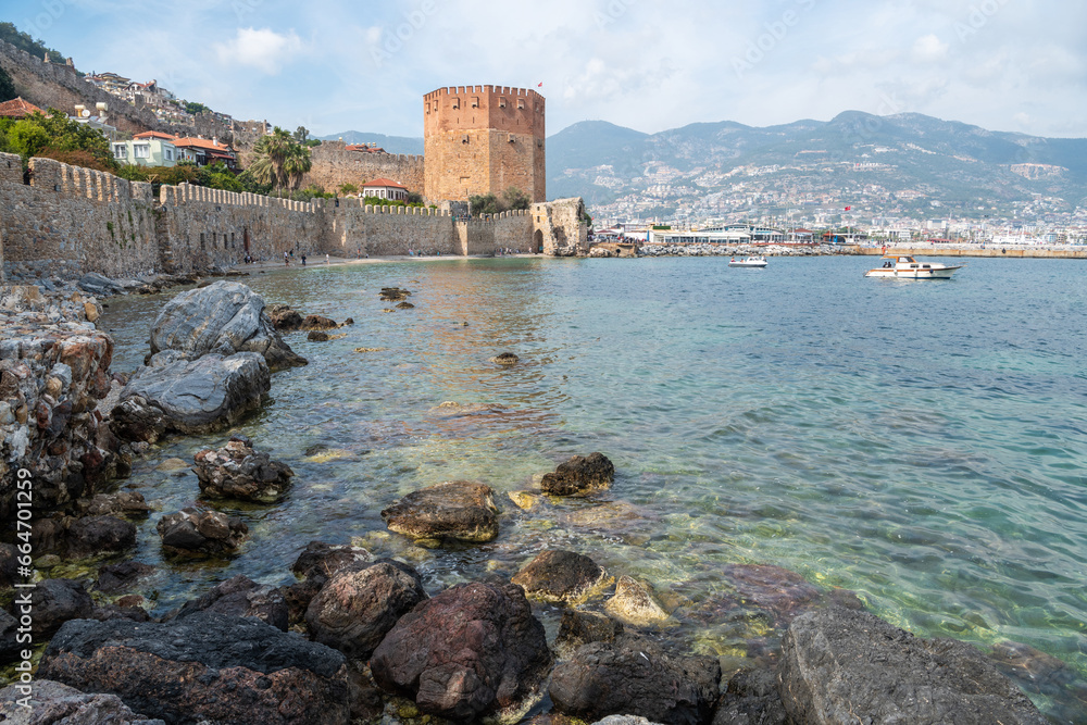 Old harbour walls and Red Tower in Alanya, Turkey