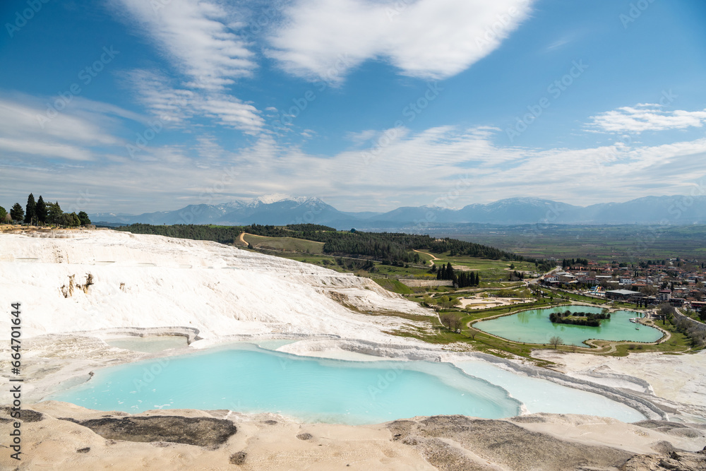 White terraces (natural travertine formations and hot pools) in Pamukkale, Turkey. 