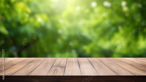 simple design background with empty wood table top and blurred green tree in the park garden