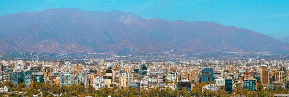 panorama of the city of Santiago Chile with its buildings,   and the Andes mountain range