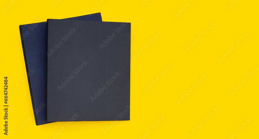 Office folders on yellow background. Top view Office folders on yellow background. Top view