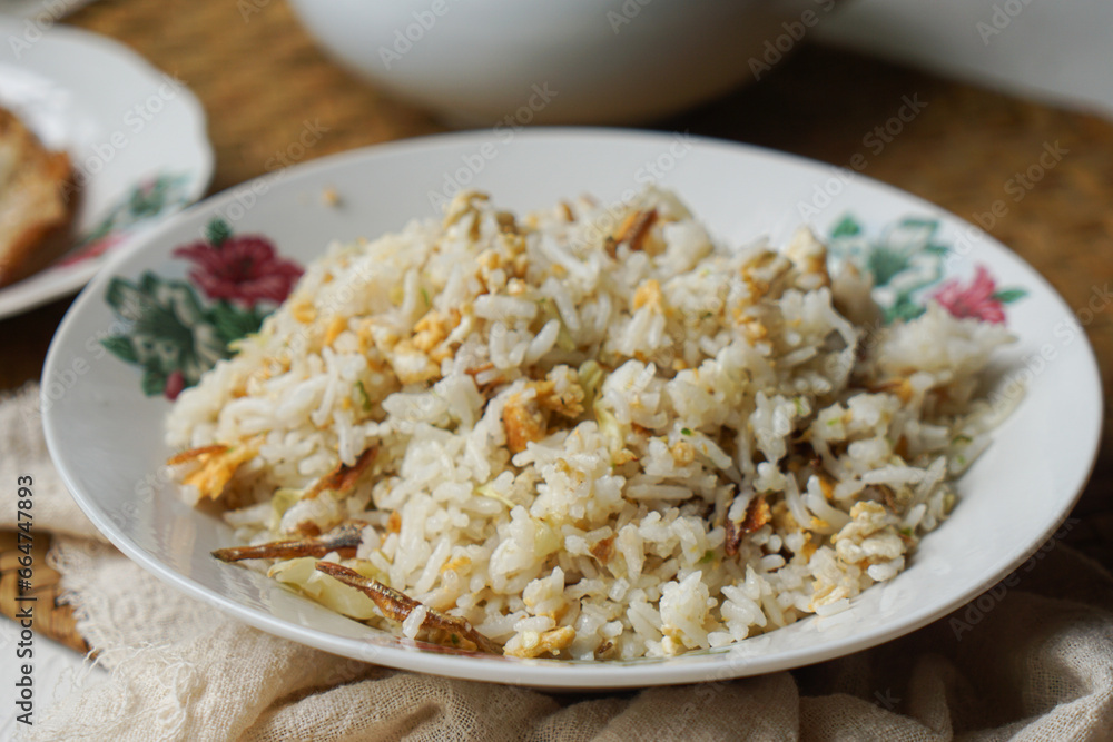 Fried rice (nasi goreng kampung) and fried egg Fried rice (nasi goreng kampung) and fried egg