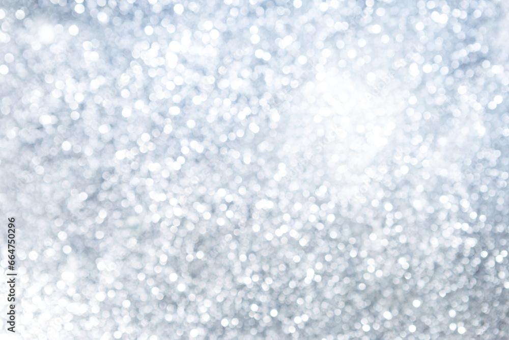 Obraz premium Abstract shiny silver glitter bokeh background, festive and holiday concept background