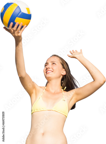 Digital png photo of happy caucasian woman in swimsuit with ball on transparent background © vectorfusionart