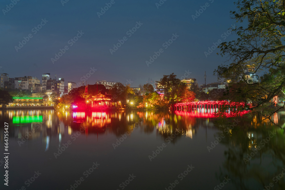 Red Bridge - The Huc Bridge in Hoan Kiem Lake, center of Hanoi, Vietnam Red Bridge - The Huc Bridge in Hoan Kiem Lake, center of Hanoi, Vietnam