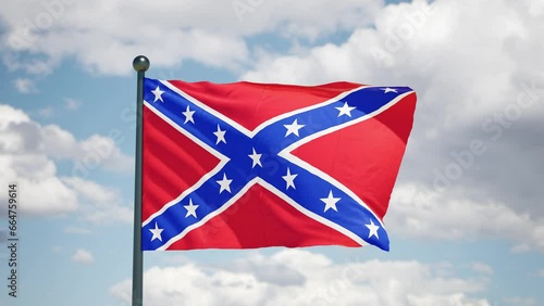Confederate navy flag 1863 flutters in the wind. Historycal USA flag on cloudy background.