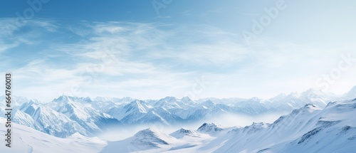 White snowy montains with blue sky, travel and vacation lifestyle, resilience and challenges concept © NoLimitStudio