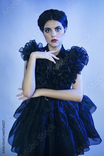 Cosplay girl in Wednesday Adams black dress