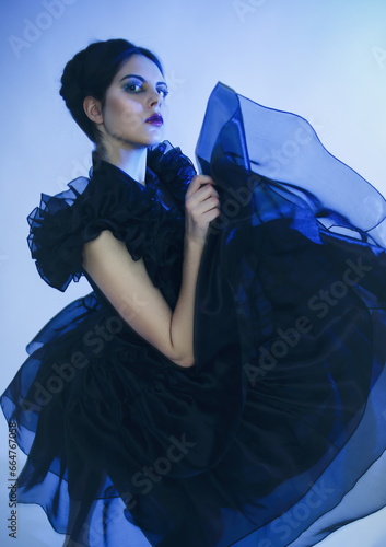Cosplay girl in Wednesday Adams black dress