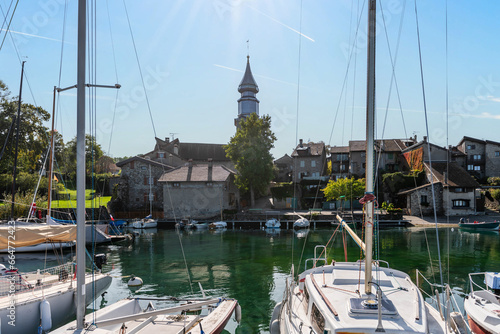 Village of Yvoire, and its beautiful Saint Pancrace church, on the banks of Lake Geneva, in Haute Savoie, France photo