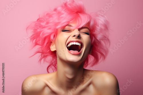 Laughing woman with bright pink hair