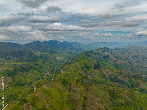 View of the valley in the mountain province. Jungle hills in the highlands of Philippines. Mindanao.