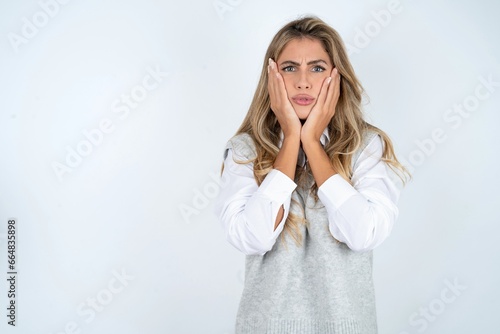 Young beautiful woman Tired hands covering face, depression and sadness, upset and irritated for problem