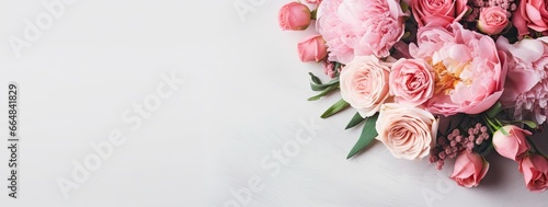 Fresh bunch of pink peonies and roses with copy space. © MdKamrul