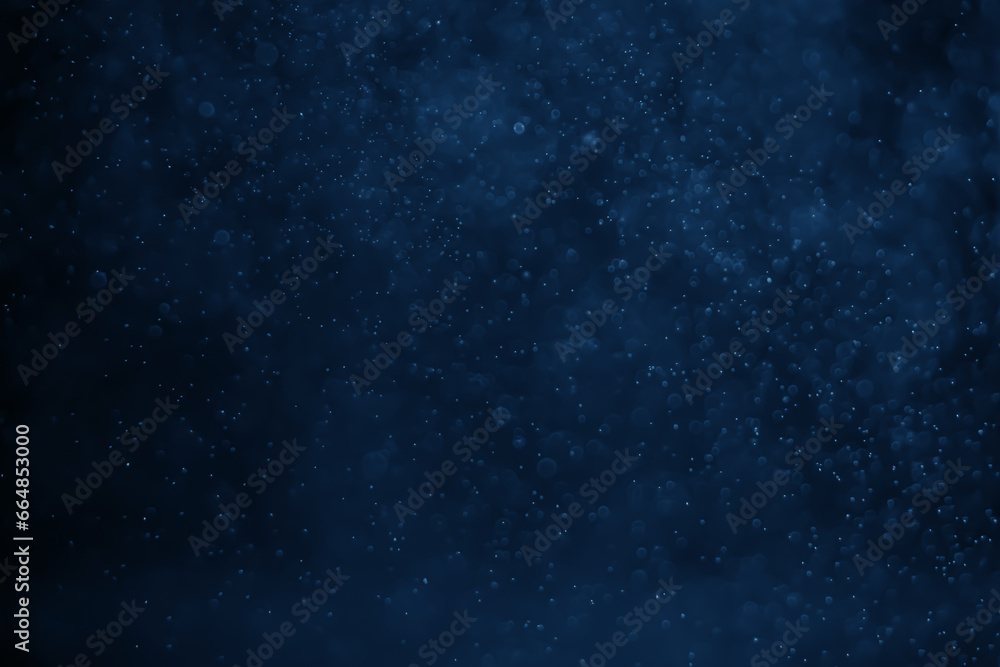 Obraz premium Abstract bokeh lights with blue background