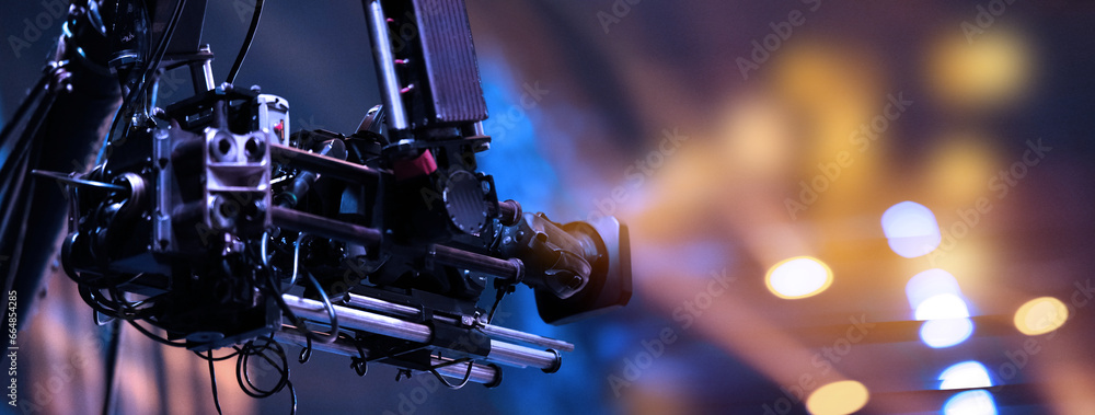 TV camera on a crane at a football match or concert. Close-up live video broadcast camera - obrazy, fototapety, plakaty 