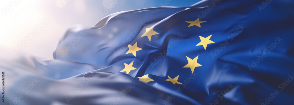 Flag of European Union waving in the breeze against a sunset sky. Banner with EU flag. Flag of European Union waving in the breeze against a sunset sky. Banner with EU flag.