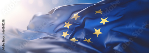 Flag of European Union waving in the breeze against a sunset sky. Banner with EU flag.