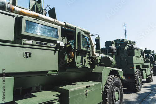 Obraz na plátně Wheeled armoured vehicles drive on the streets of Warsaw