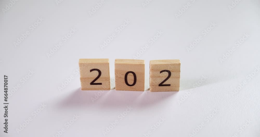 Making a countdown for the coming new year 2024 using the numbers etched on wooden tiles. Making a countdown for the coming new year 2024 using the numbers etched on wooden tiles.