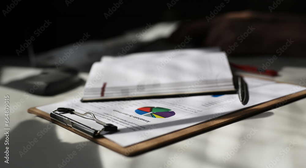 Fototapeta premium paper document diagram notebook lie on table at office