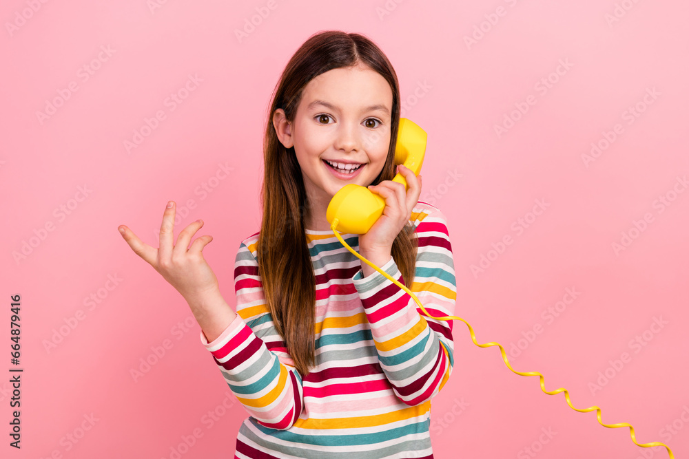 Photo of call friends retro cable telephone little girl communicating excited good news back to school isolated on pink color background Photo of call friends retro cable telephone little girl communicating excited good news back to school isolated on pink color background