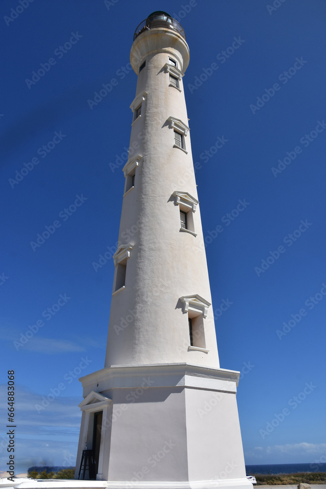 Towering Lighthouse Reaching up to the Sky in Aruba