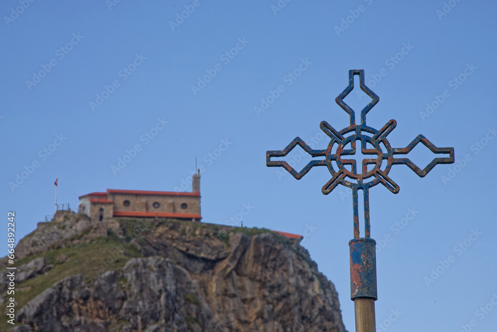 BERMEO, SPAIN, September 26, 2023 : Cross of one of stations of the Cross to San Juan de Gaztelugatxe.