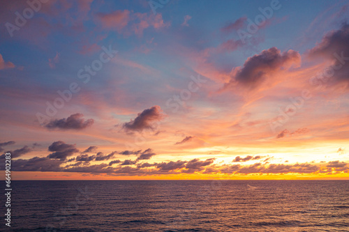 ..sweet sky at sunset. Gradient color. Sky texture, abstract nature background..Sunset with sweet yellow color light rays and other atmospheric effects..Big sunset and sweet lighting sky..exotic red 