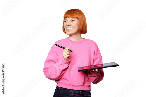 A smiling female designer in a pink sweet shot holding a graphic tablet.