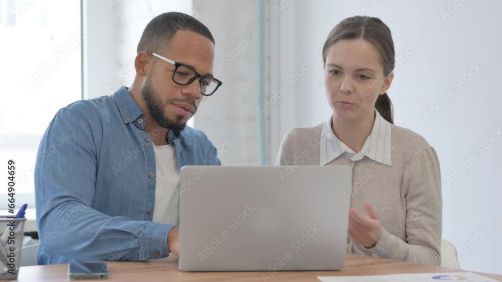 Multi Ethnic Casual People Working on Laptop Together Multi Ethnic Casual People Working on Laptop Together