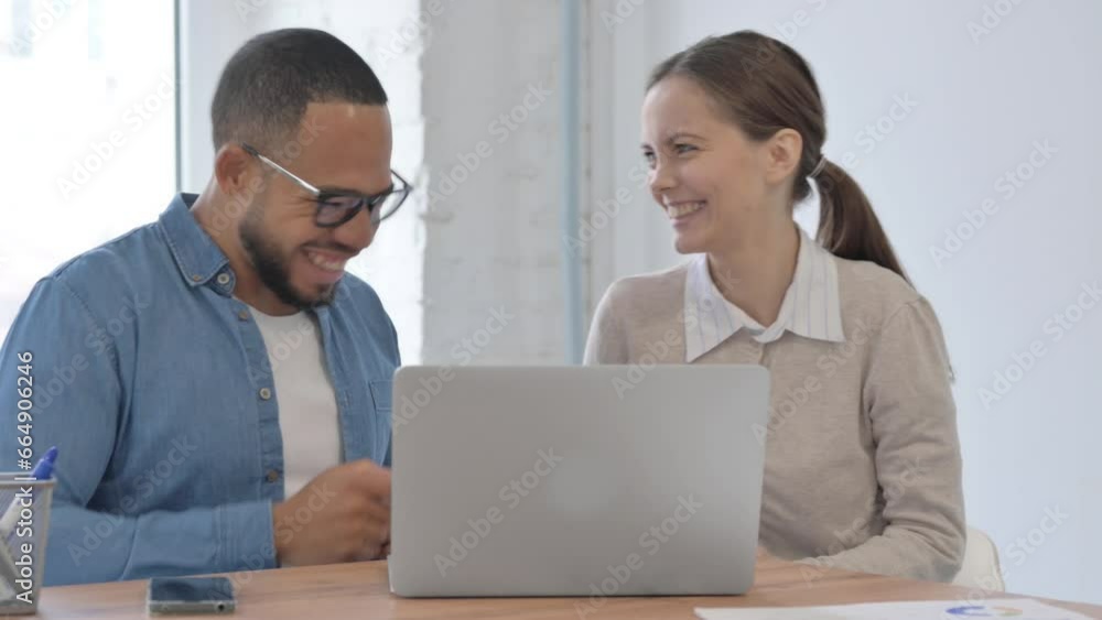 Excited Multi Ethnic Casual People Celebrating Success at Work Excited Multi Ethnic Casual People Celebrating Success at Work