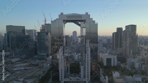 wide flying right view of Umeda Sky Building in Osaka Japan