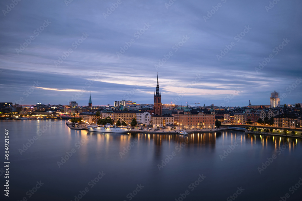 Fototapeta premium Scenic panoramic aerial view of Riddarholmen, Gamla Stan, in the Old Town in Stockholm after sunset