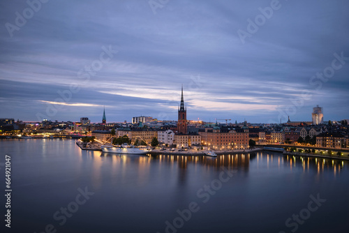 Scenic panoramic aerial view of Riddarholmen, Gamla Stan, in the Old Town in Stockholm after sunset © BERK OZDEMIR