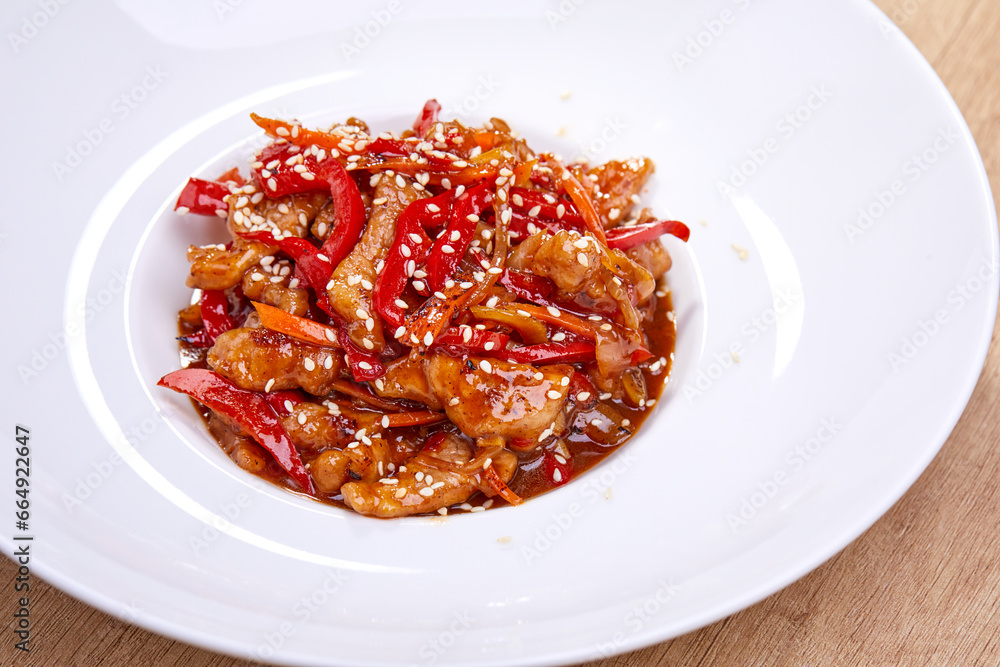 crispy fried sesame chicken in white plate crispy fried sesame chicken in white plate