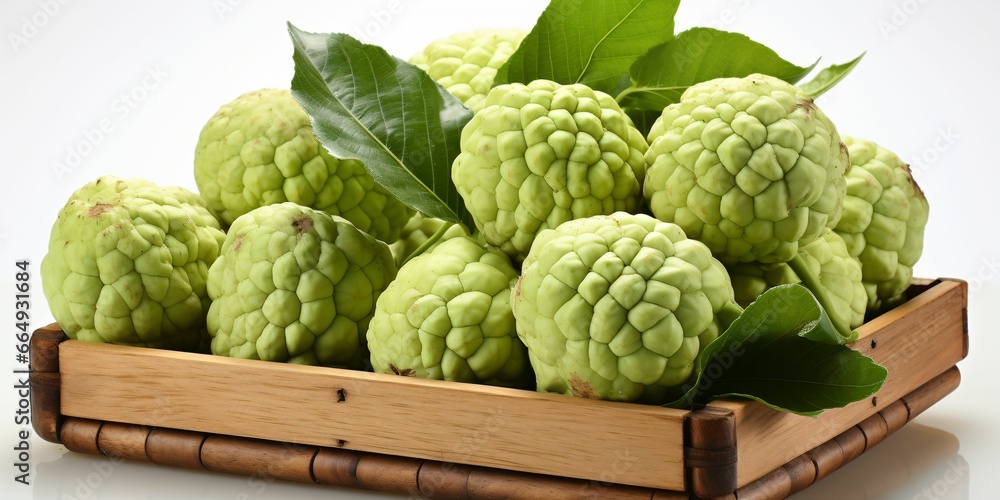 Fototapeta premium Fresh Custard Apples in a Basket. Sugar Apple. Healthy Fruit
