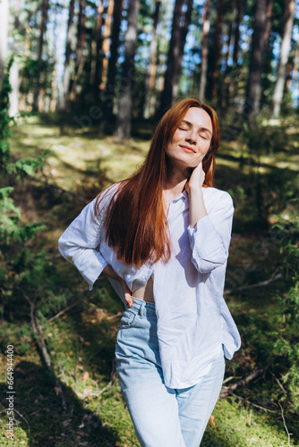 Beautiful woman natural face freckles casual female portrait lifestyle beauty girl. Outdoor girl portrait in green summer forest