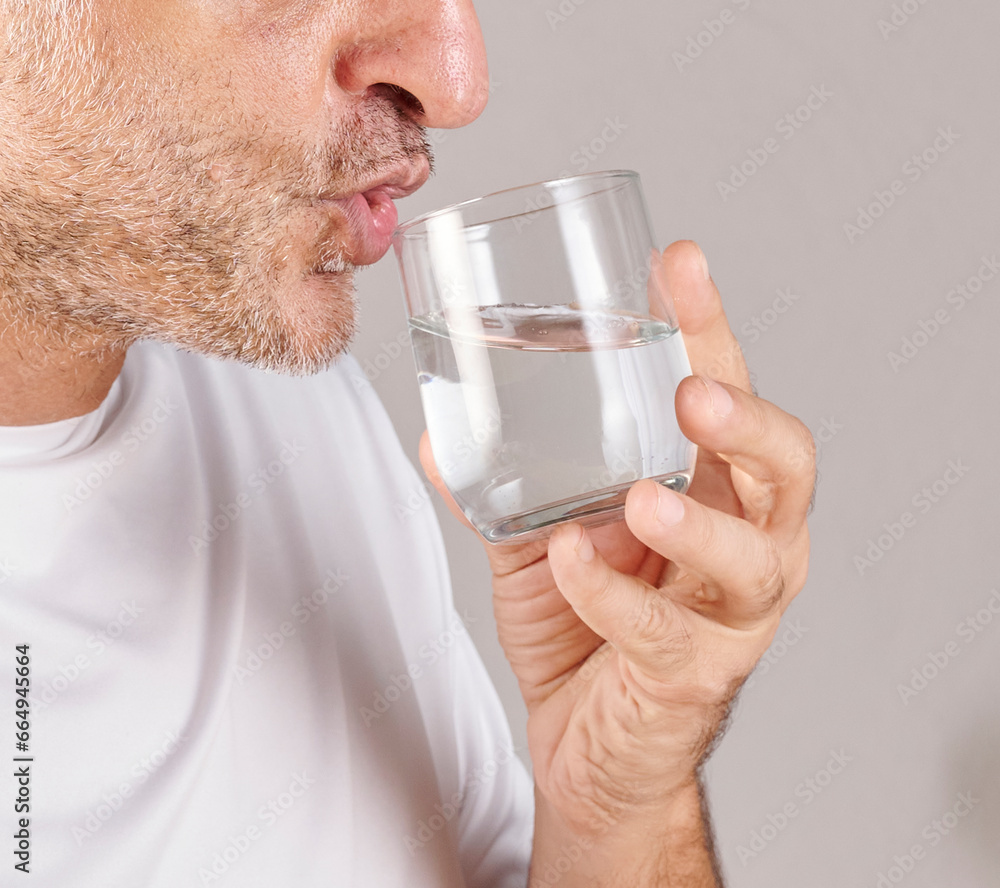 Man is eating fruits, close up mouth in the kitchen style. Man is eating fruits, close up mouth in the kitchen style.